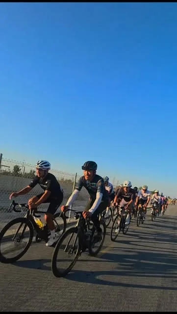 Veloaded riders in a paceline on a Wednesday sunset ride